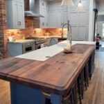 Wood countertop with farmhouse sink.
