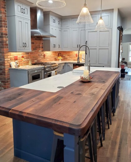 Wood countertop with farmhouse sink. 